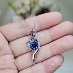 Bow Tanzanite Necklace - 18KGP Sterling Silver - 2 CT Round Blue Tanzanite Pendant - Swirl Knot Style - December Birthstone #557