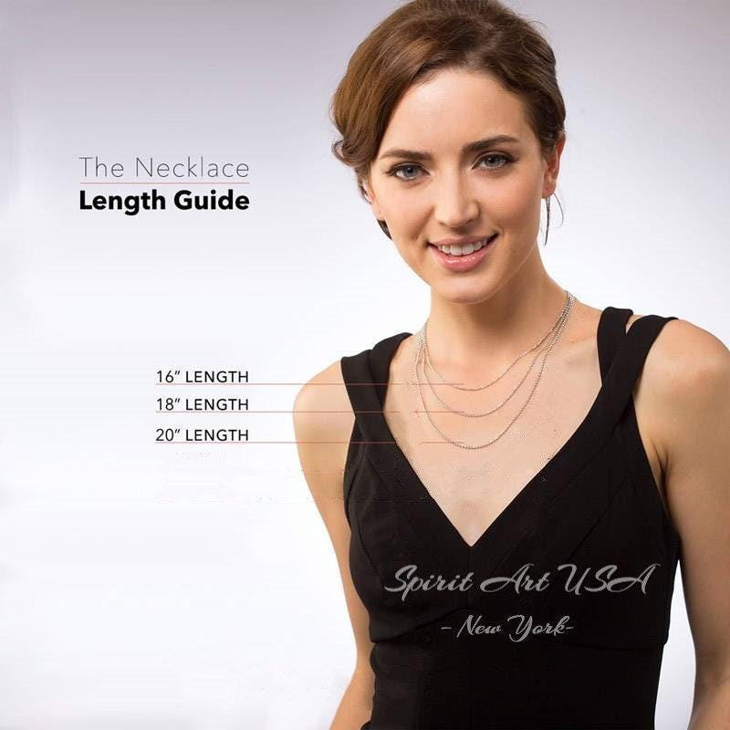 The image is a portrait of a woman wearing a black dress, with a focus on the necklace she is wearing. The image includes text that provides a necklace length guide, indicating the necklace's length in inches, with the shortest necklace being 16 inches long and the longest being 20 inches long.